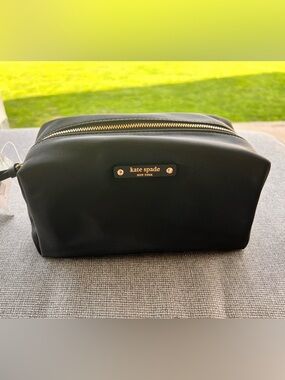 kate spade black toiletry pouch with gold hardware